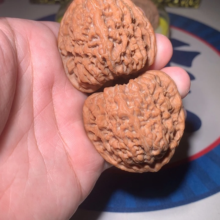 彝***族吊坠文玩核桃南将石