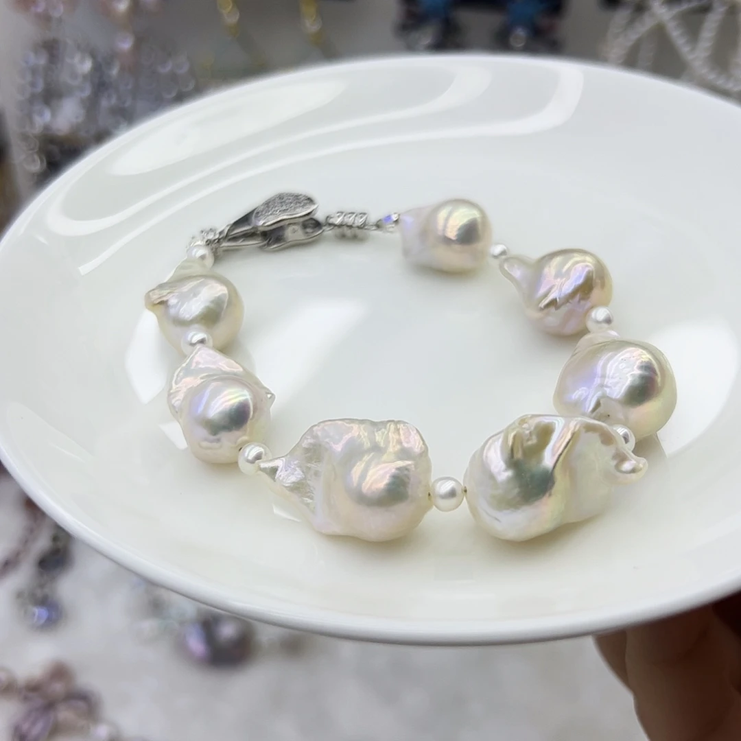 淡水珍珠银S925镶嵌耳饰