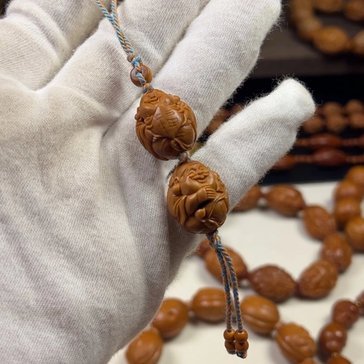 橄榄核手串镂空小财神