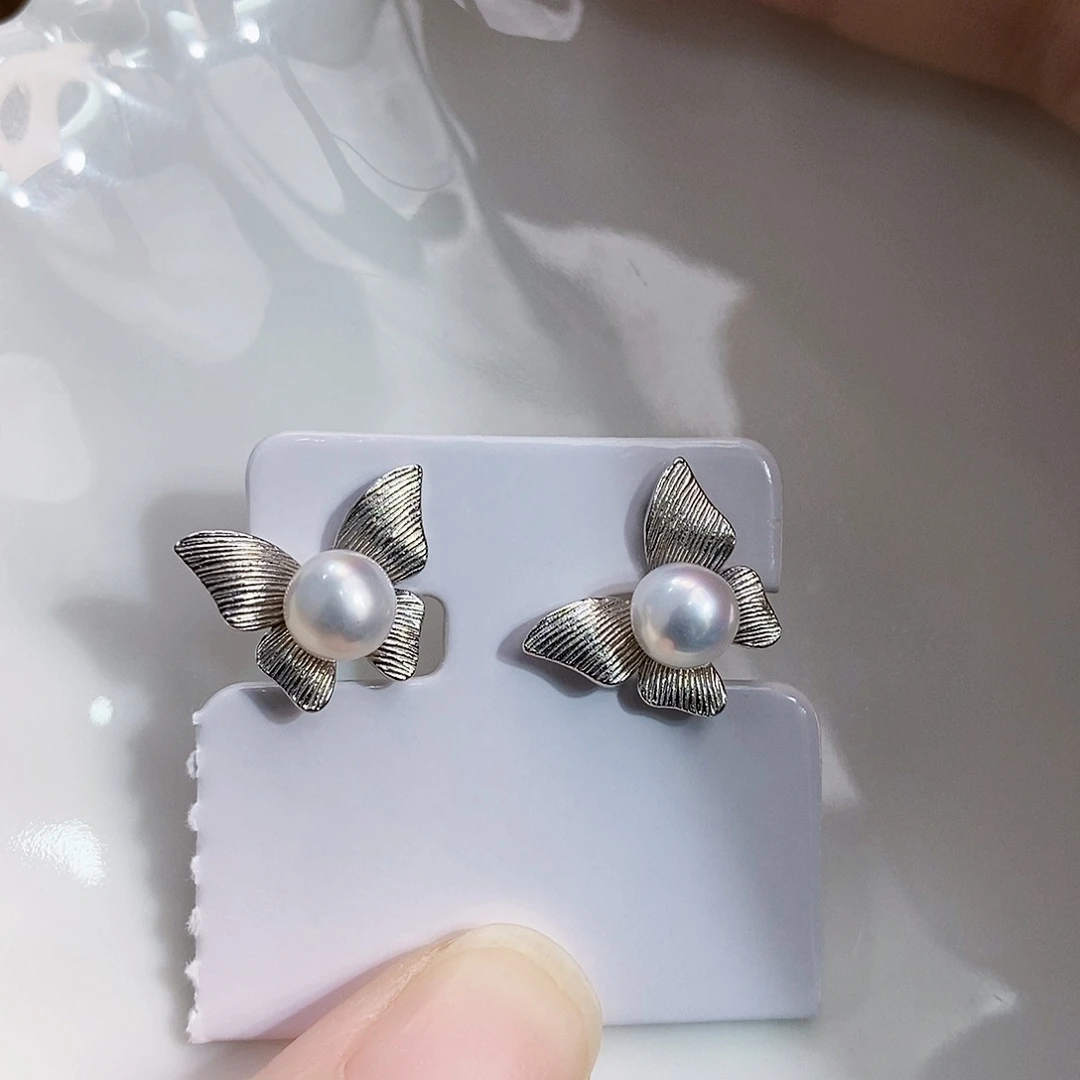银S925镶嵌特价极光耳饰淡水珍珠K****1