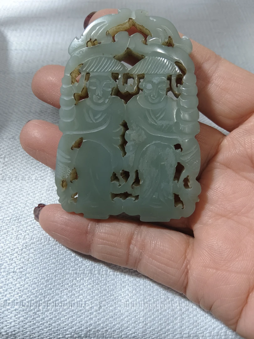 和田玉挂件一件。