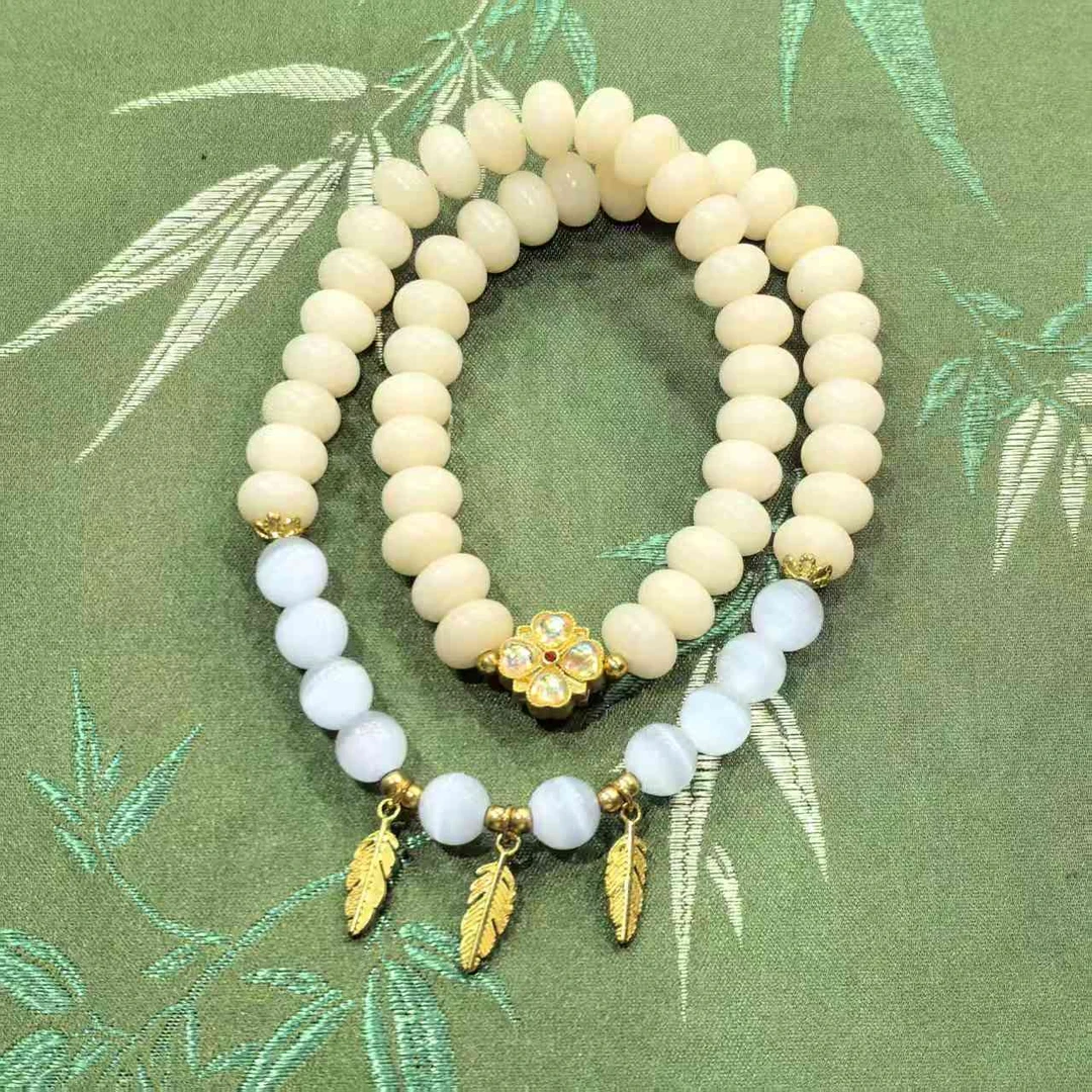 JG0011-米黄菩提0.6*0.9+四叶草隔珠叶子-50颗