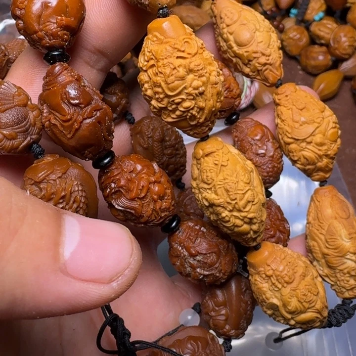 回***难手串橄榄核你的电话