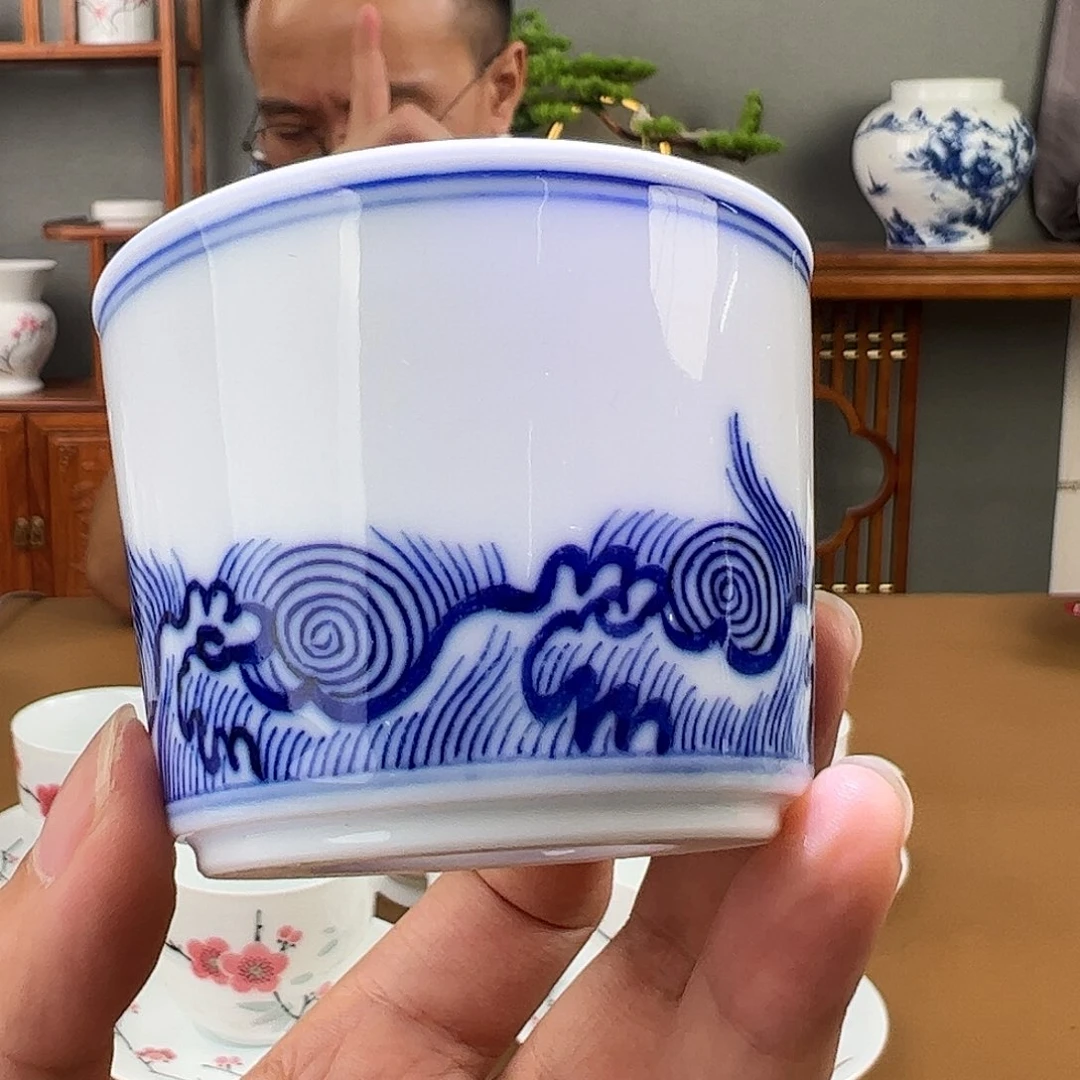 滑石子 青花海浪纹书卷杯