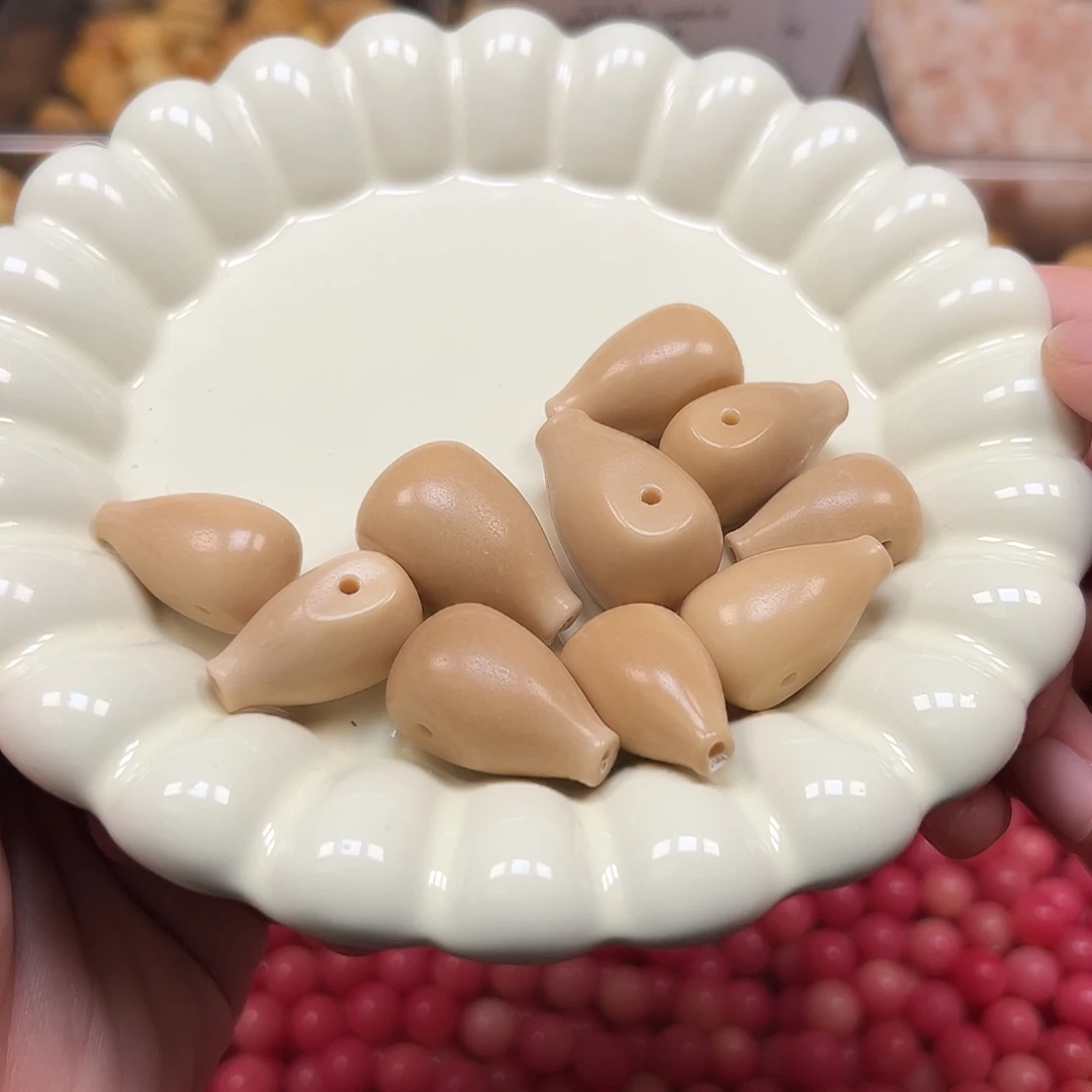 手串菩提根/象牙果瑕疵咖色三通10颗
