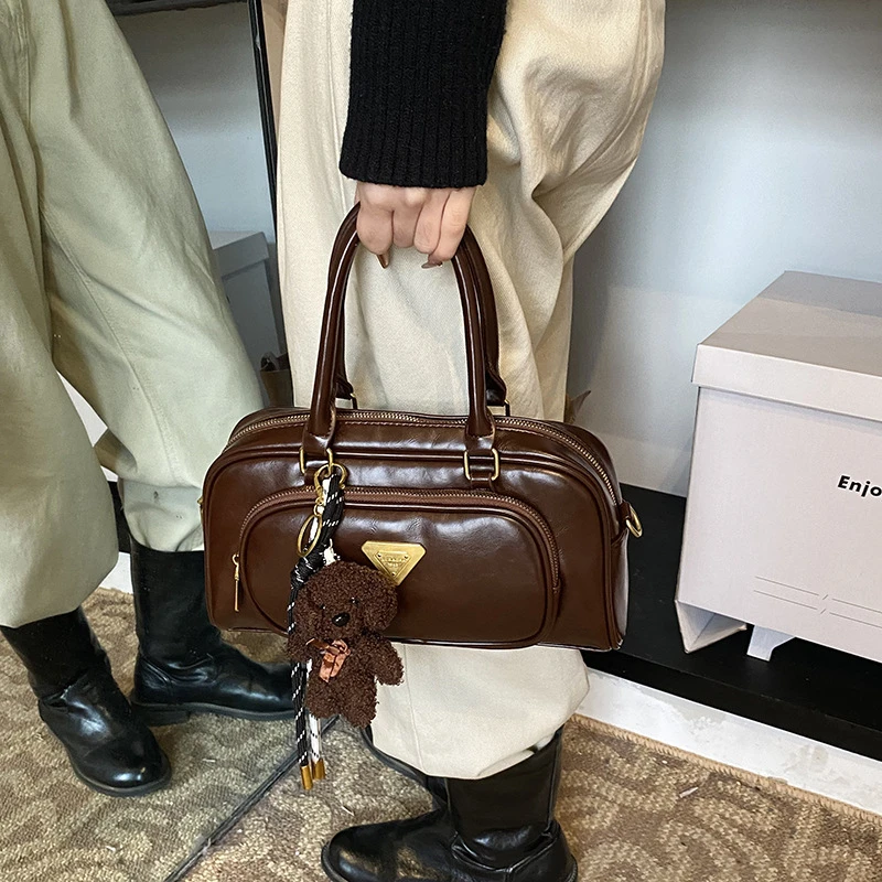 路遥女包时尚简约手提保龄球包女2025早春新款韩系纯色斜挎包大容