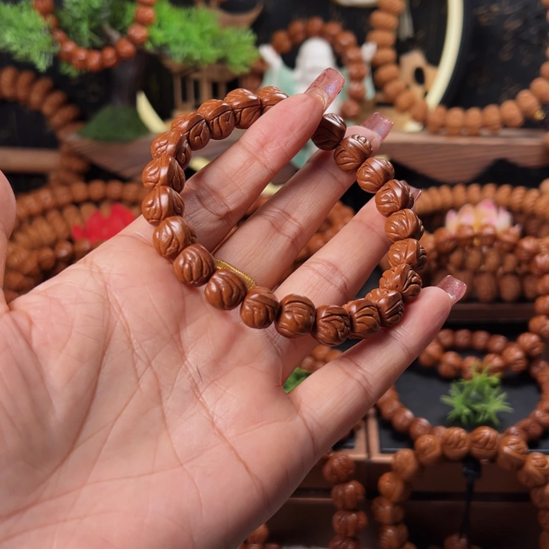 桃核手串幸****@11顶级玉龙脊单圈