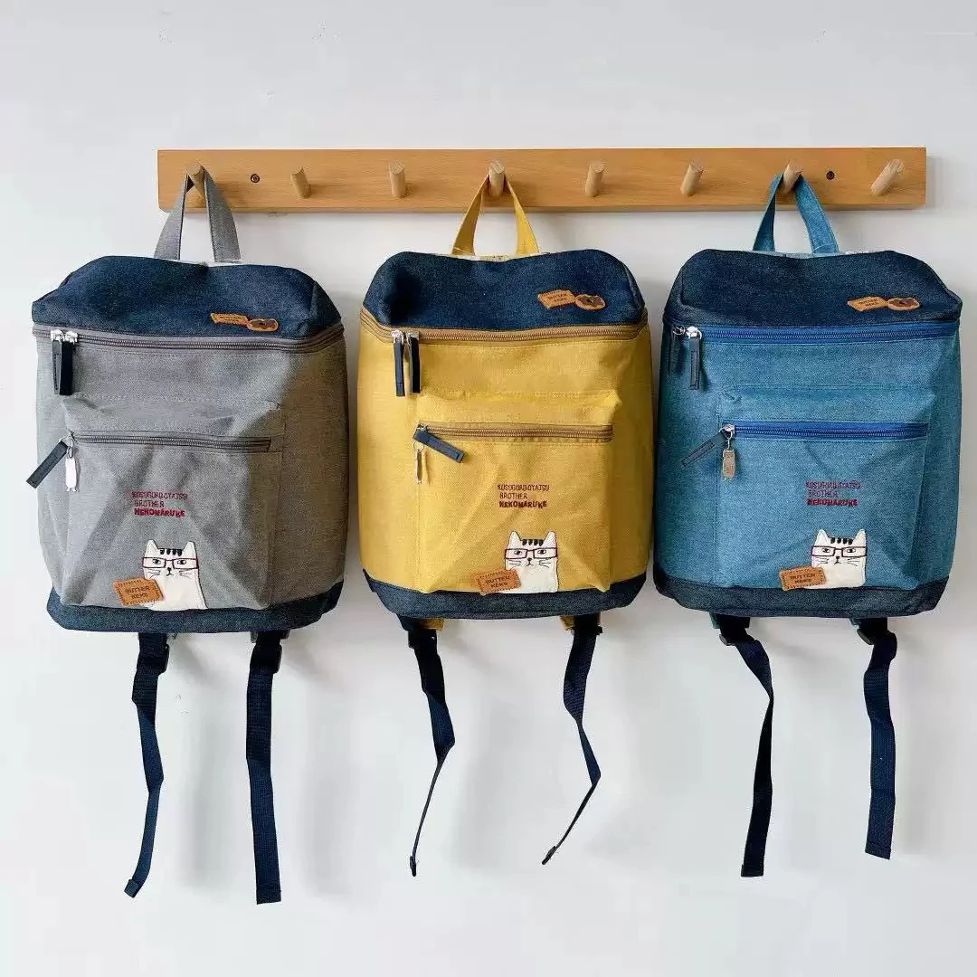 透气简约风拉链猫女青年防水书包韩版简约双肩背复古