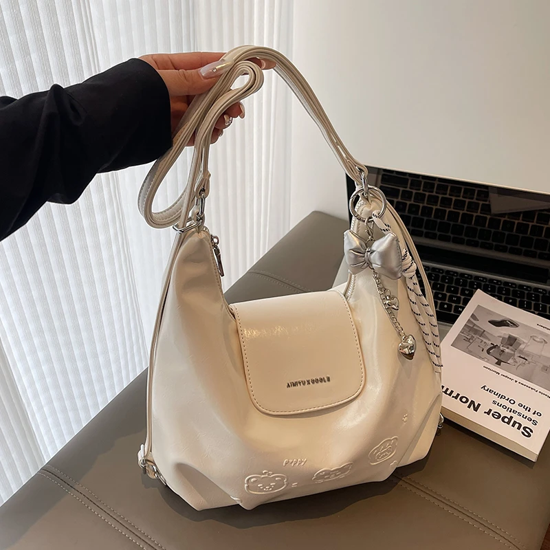 COOLE女包2025新款简约百搭时尚双肩包纯色小众设计通勤单肩包