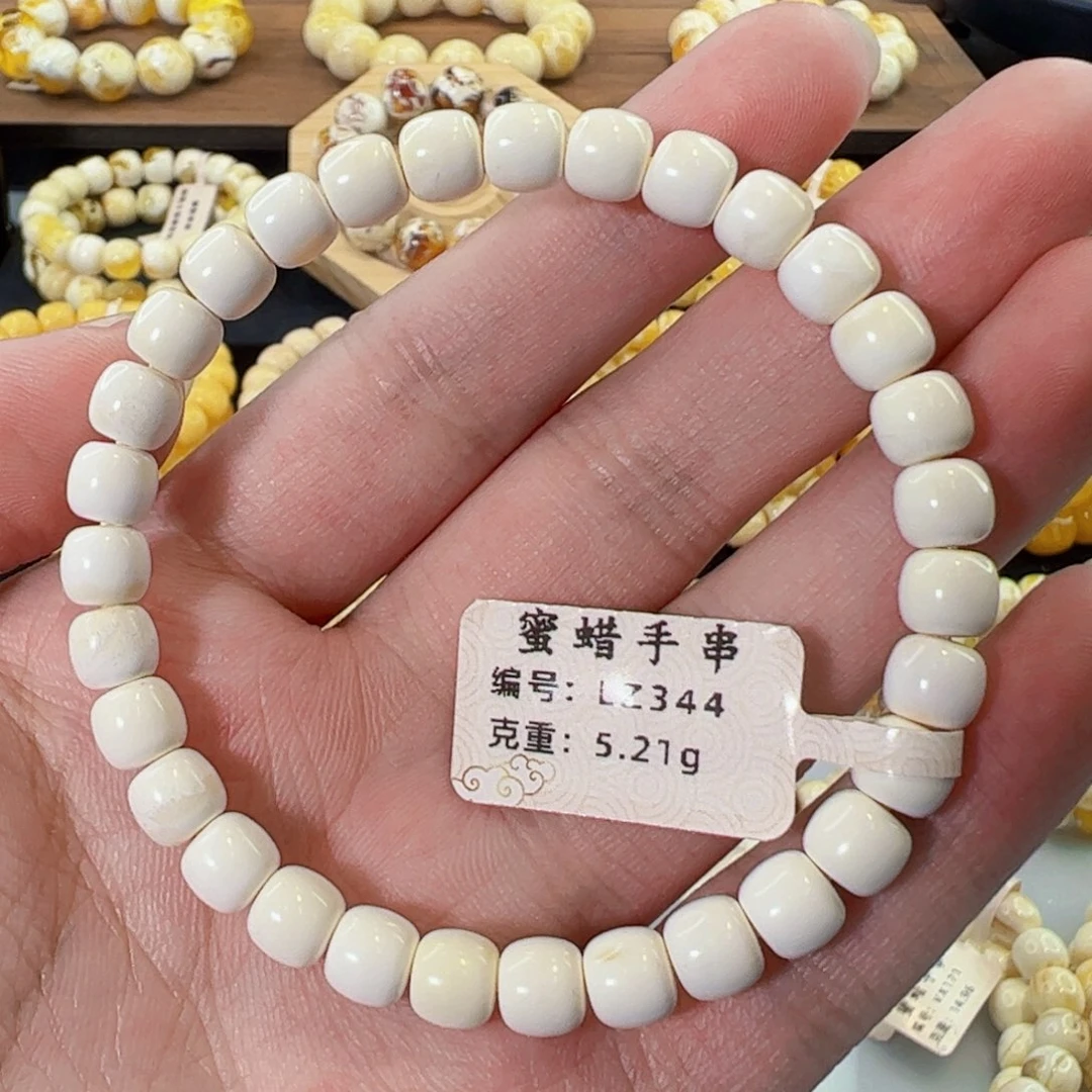 琥珀未镶嵌裸石6.5mm漆白满蜡老型手串