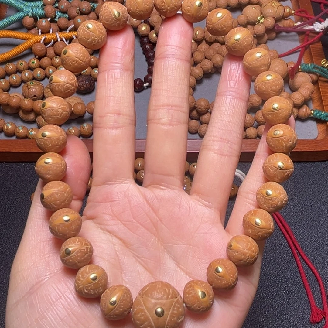 凤眼菩提吊坠12mm精品铜钉手持