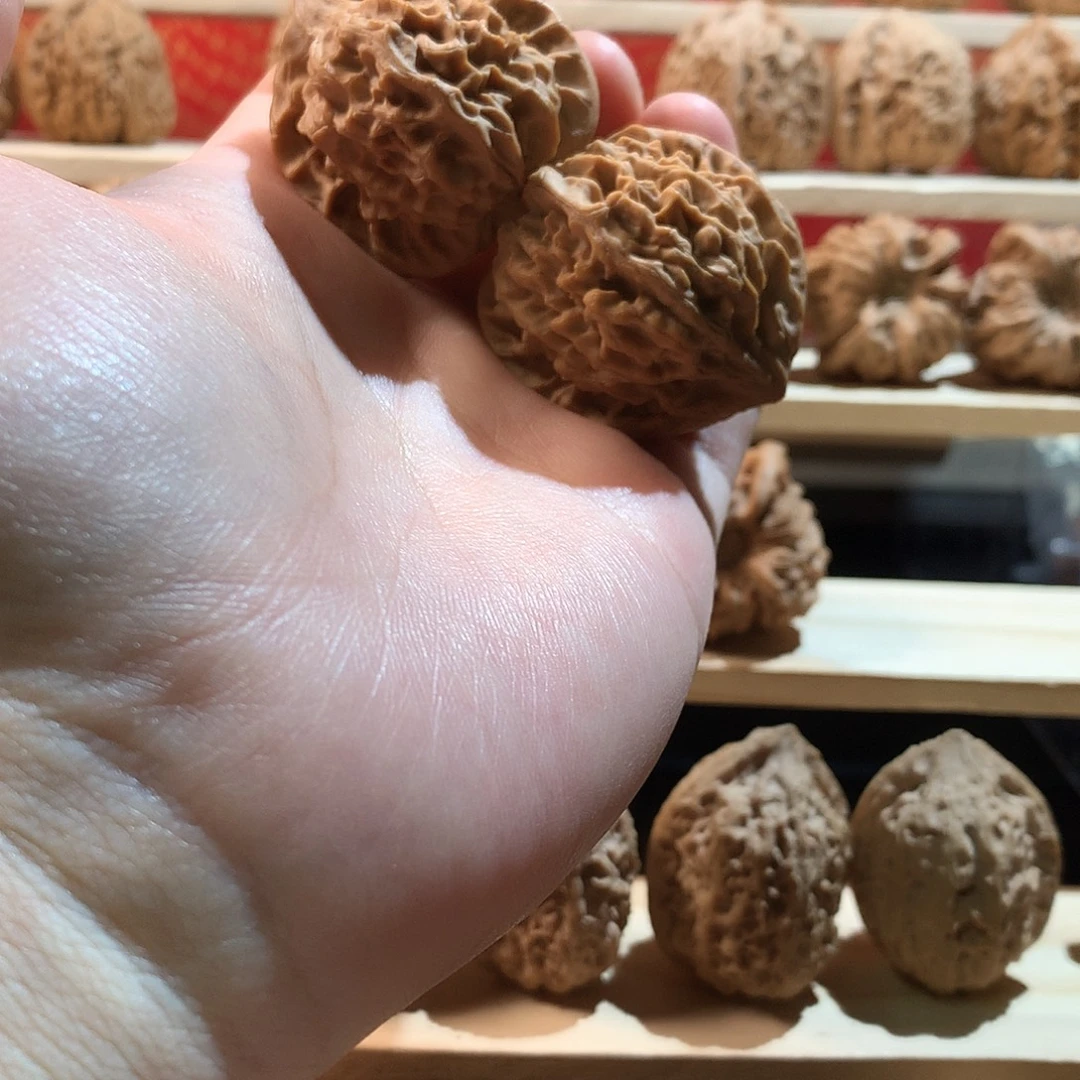 @***伟核桃40龙门涧文玩核桃手把件