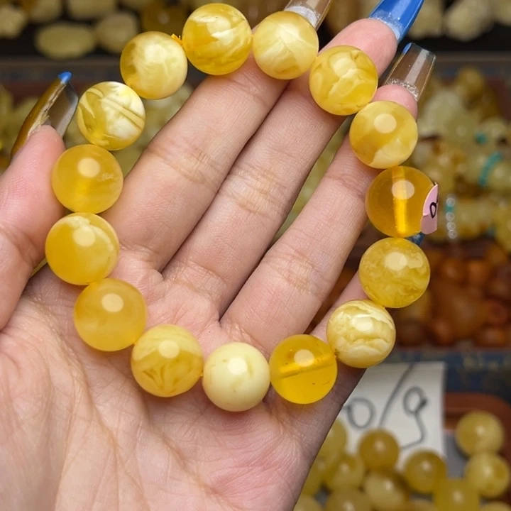 蜜蜡未镶嵌珠宝奇石181-天然蜜蜡满蜡妖花圆珠手串微瑕