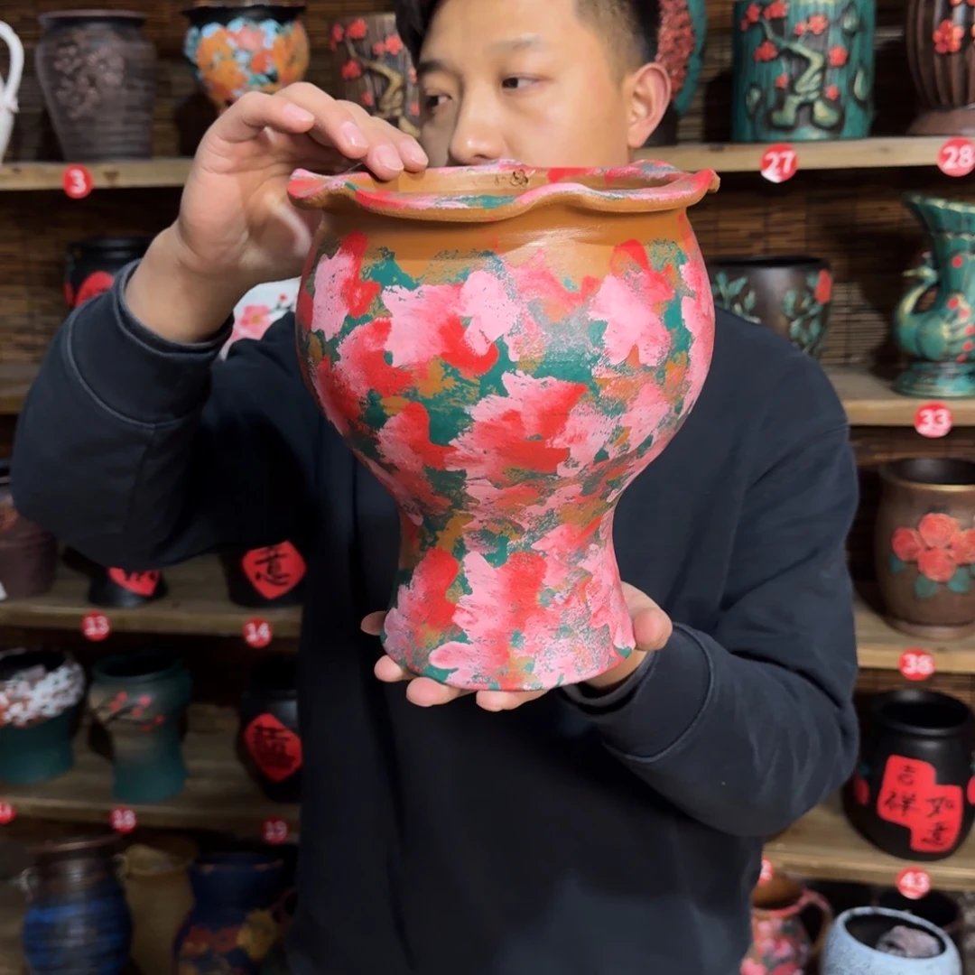 有孔红陶浮雕花盆炸炸炸