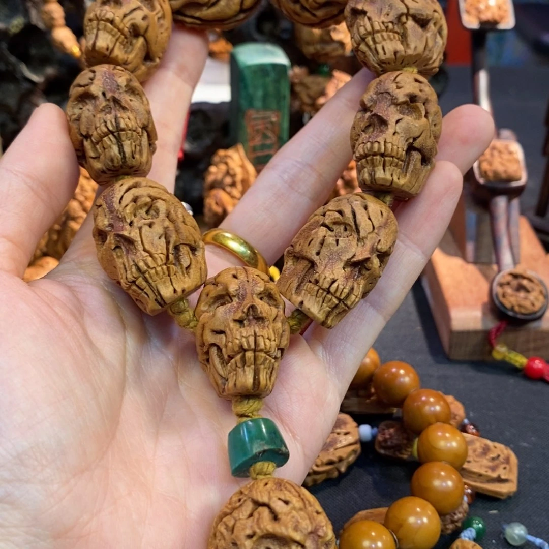 潍坊核雕桃核雕刻骷髅手串