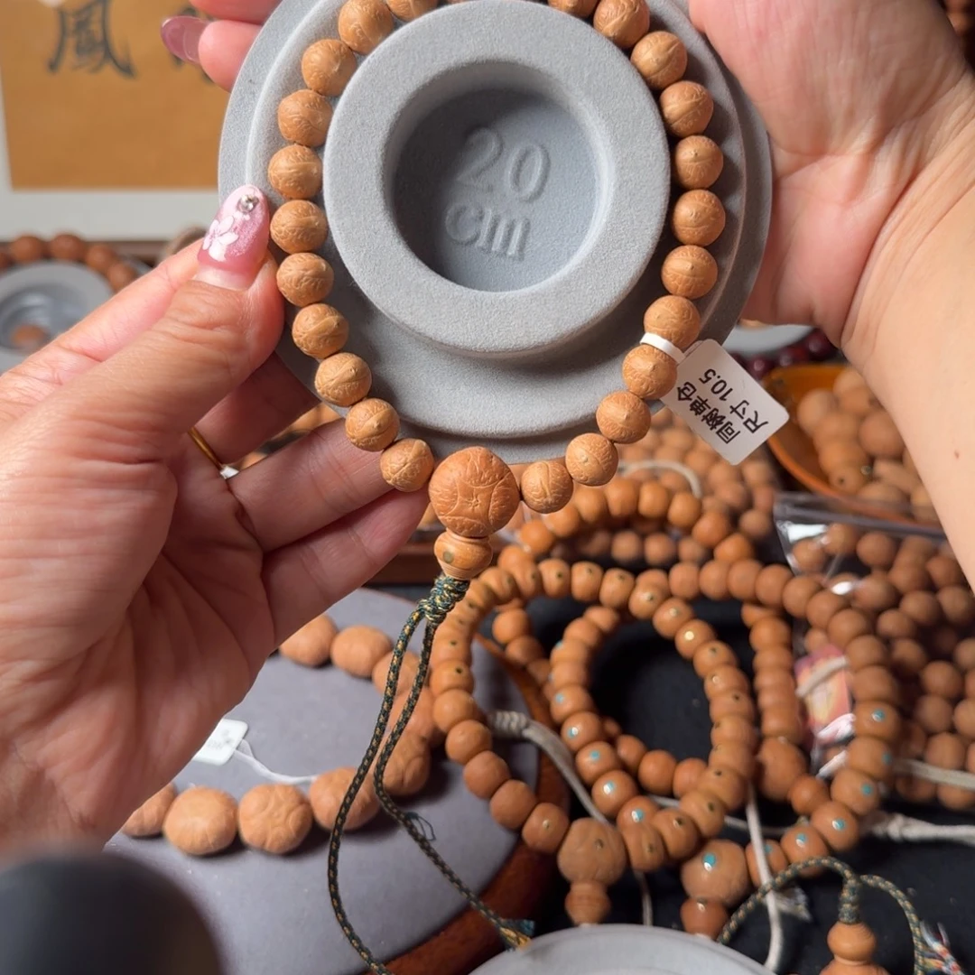 凤眼菩提把件25颗手持