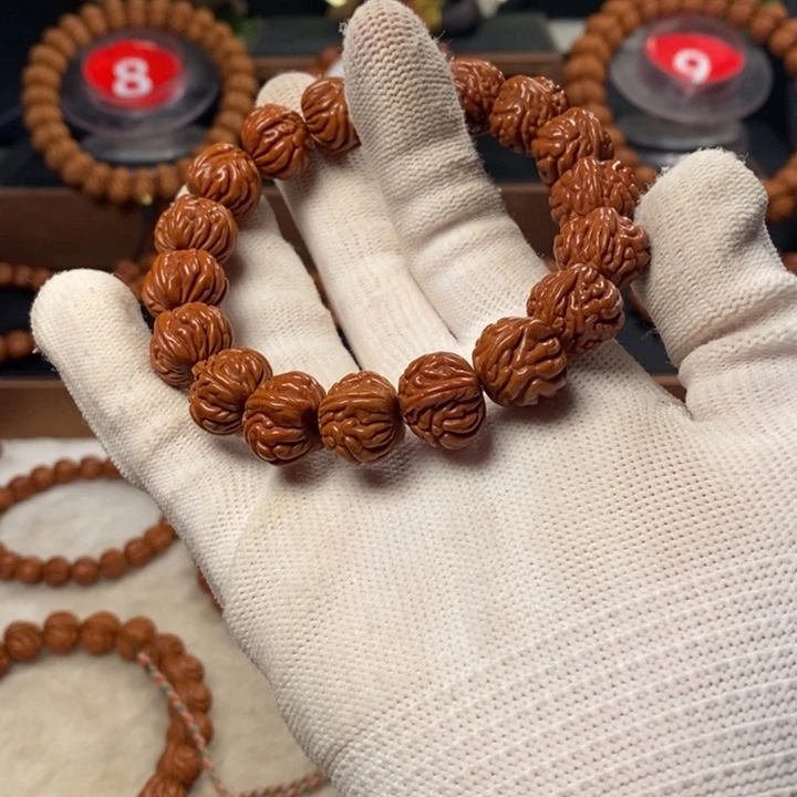 桃核吊坠啊*额秦岭龙纹