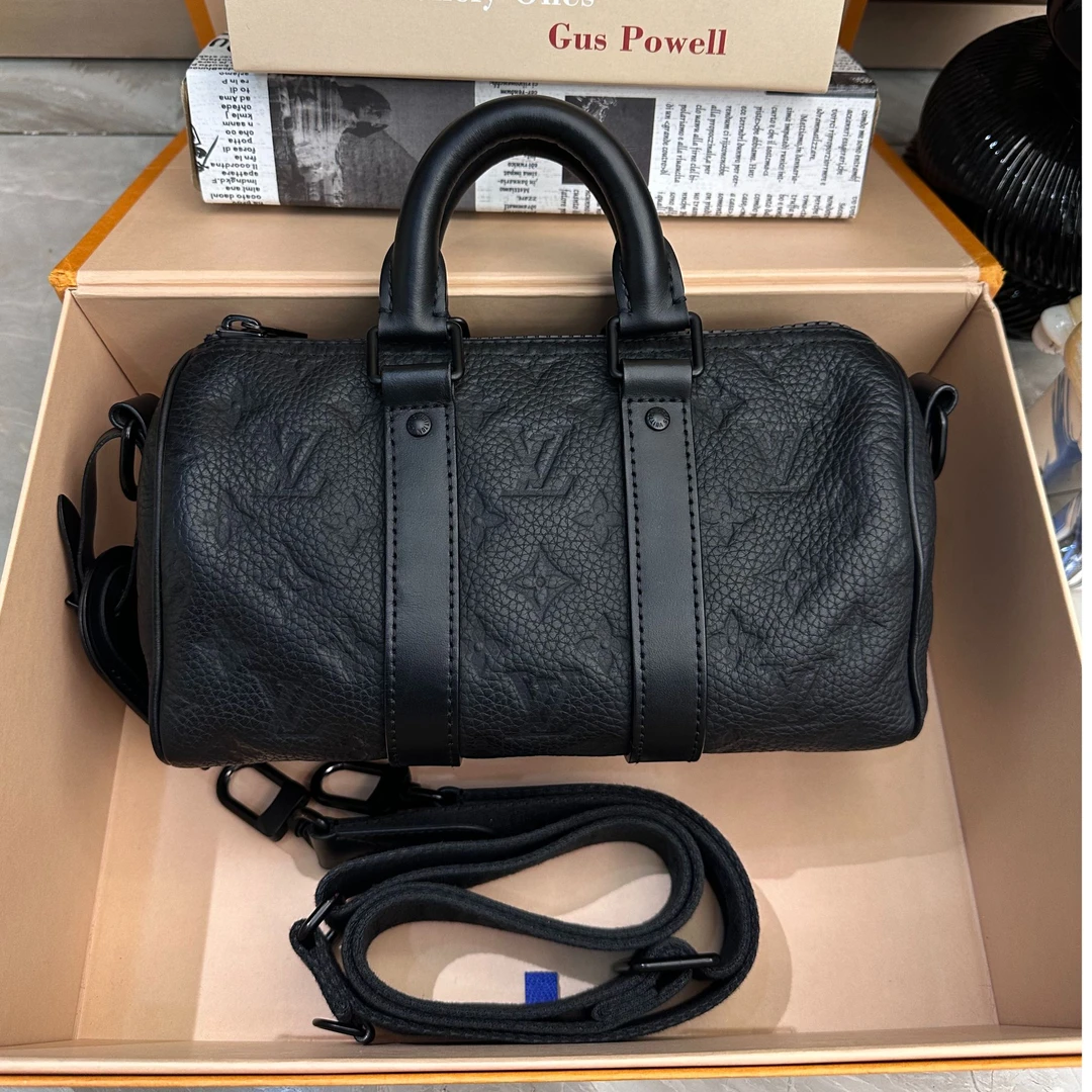 99新 LouisVuitton/路易威登 黑武士全皮压纹keepall25手提包0228