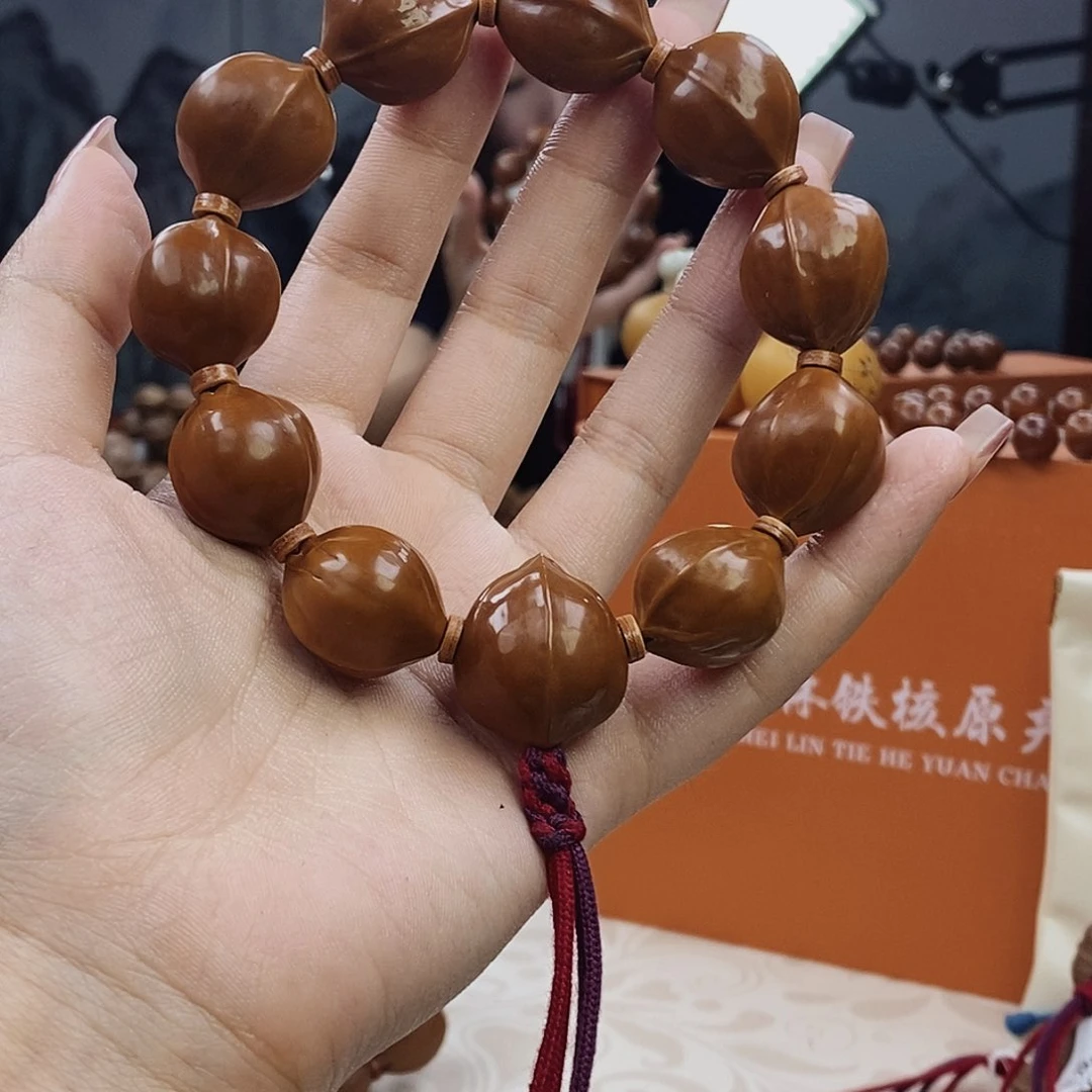 手串橄榄核L****_原生态正宗梅林铁核