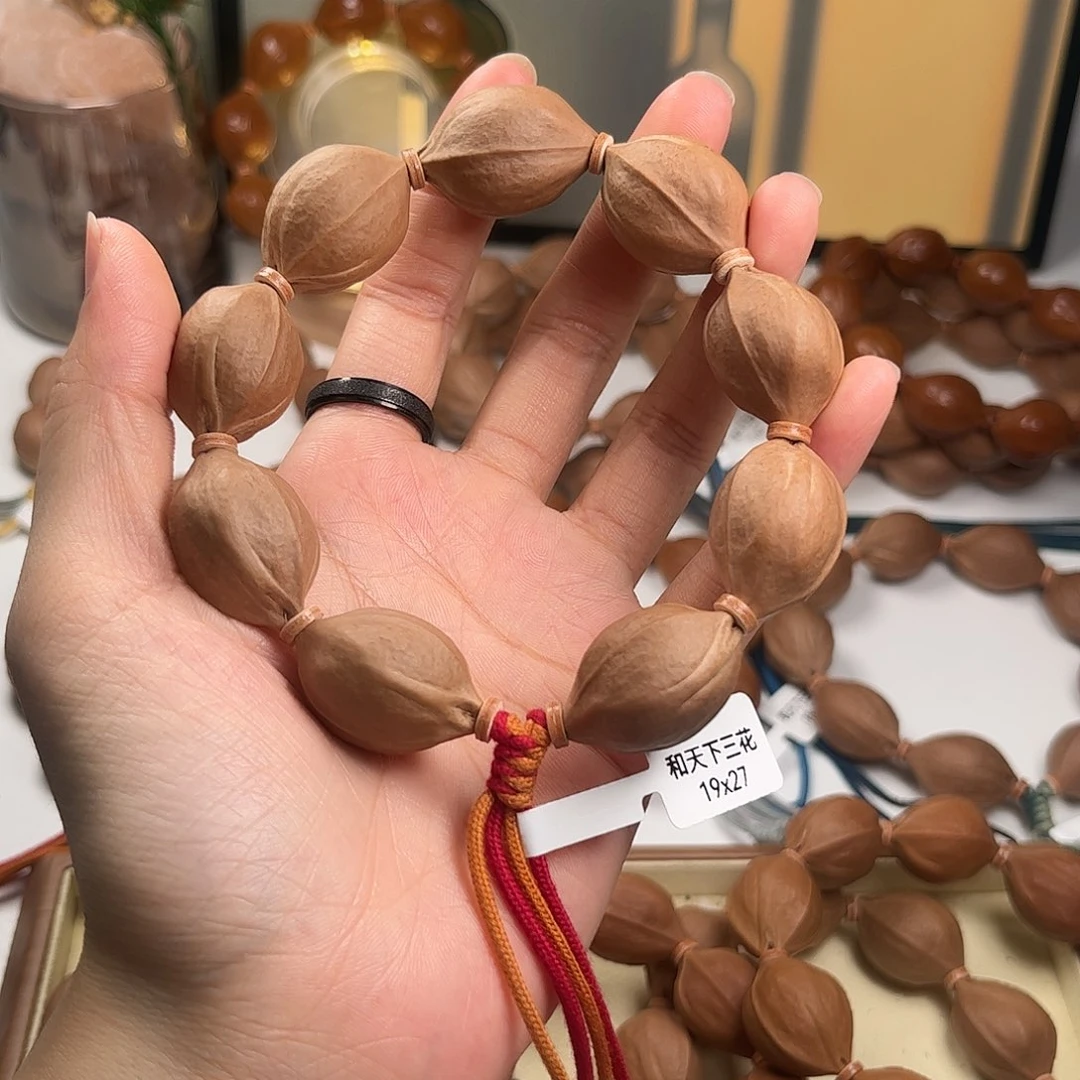 朱***.吊坠橄榄核梅林铁核1927