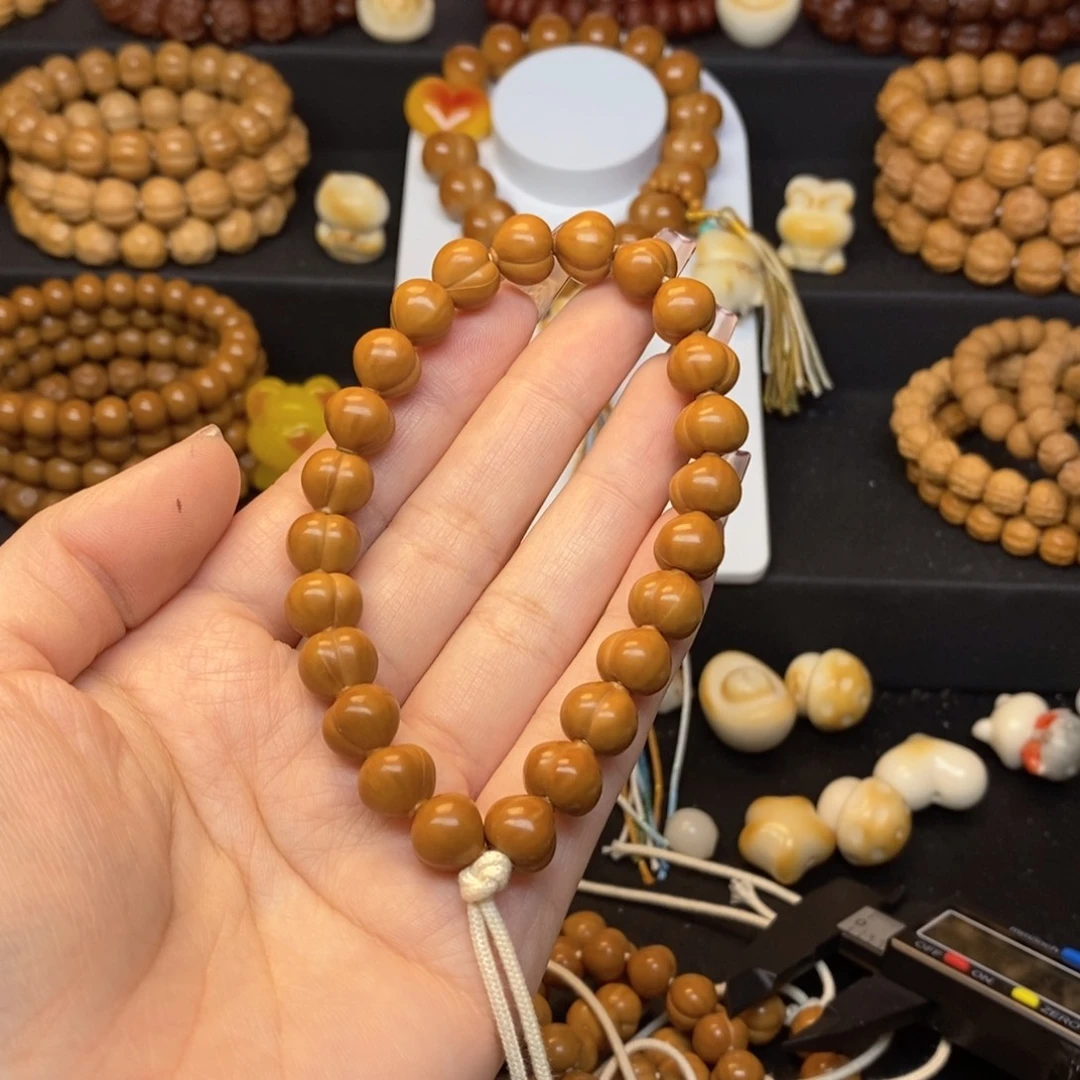 洋***咪猴头核桃吊坠反油小屁桃手持