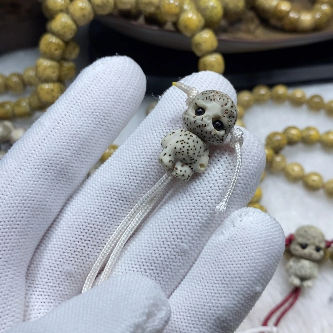 文***齐星月菩提手串石玉阿呆1个