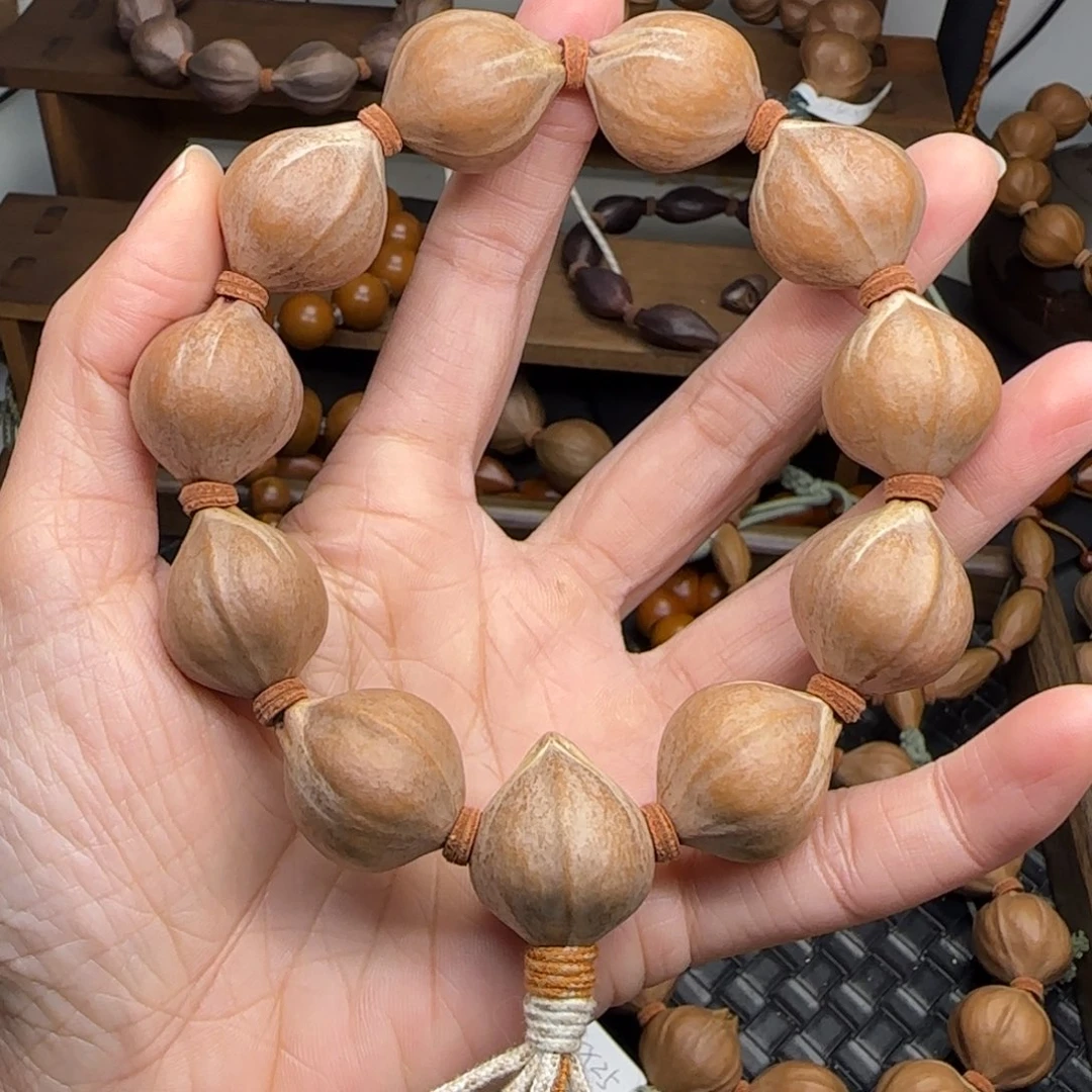 手串橄榄核15。2.0*2.5三花老树