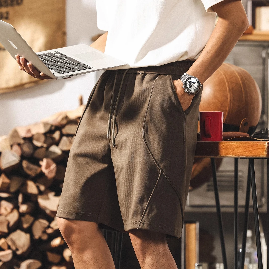 美式复古休闲短裤男夏季2025新款潮流拼接简约宽松设计感五分裤男