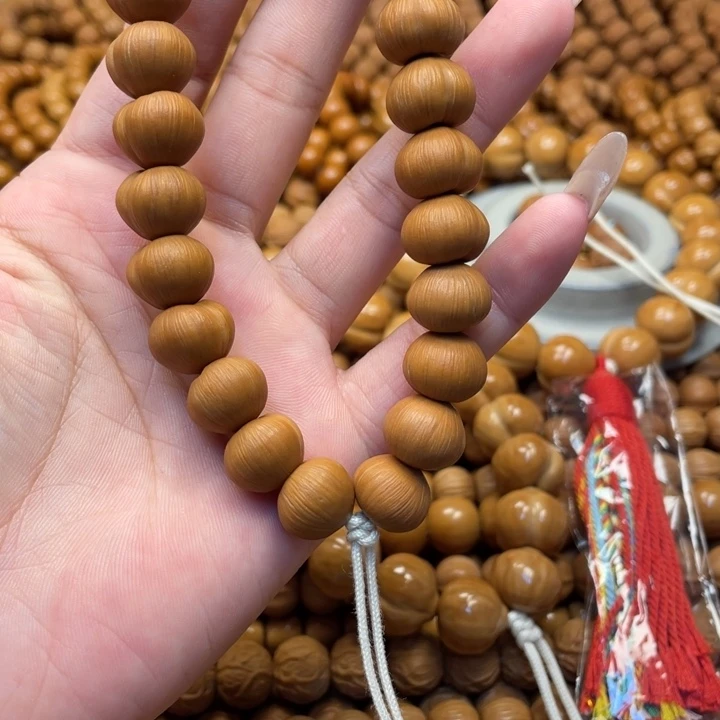 悲***界核桃微瑕原色屁桃手持