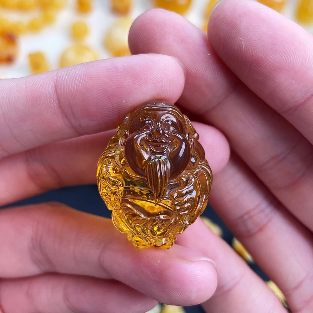 邱***邱琥珀未镶嵌珠宝奇石