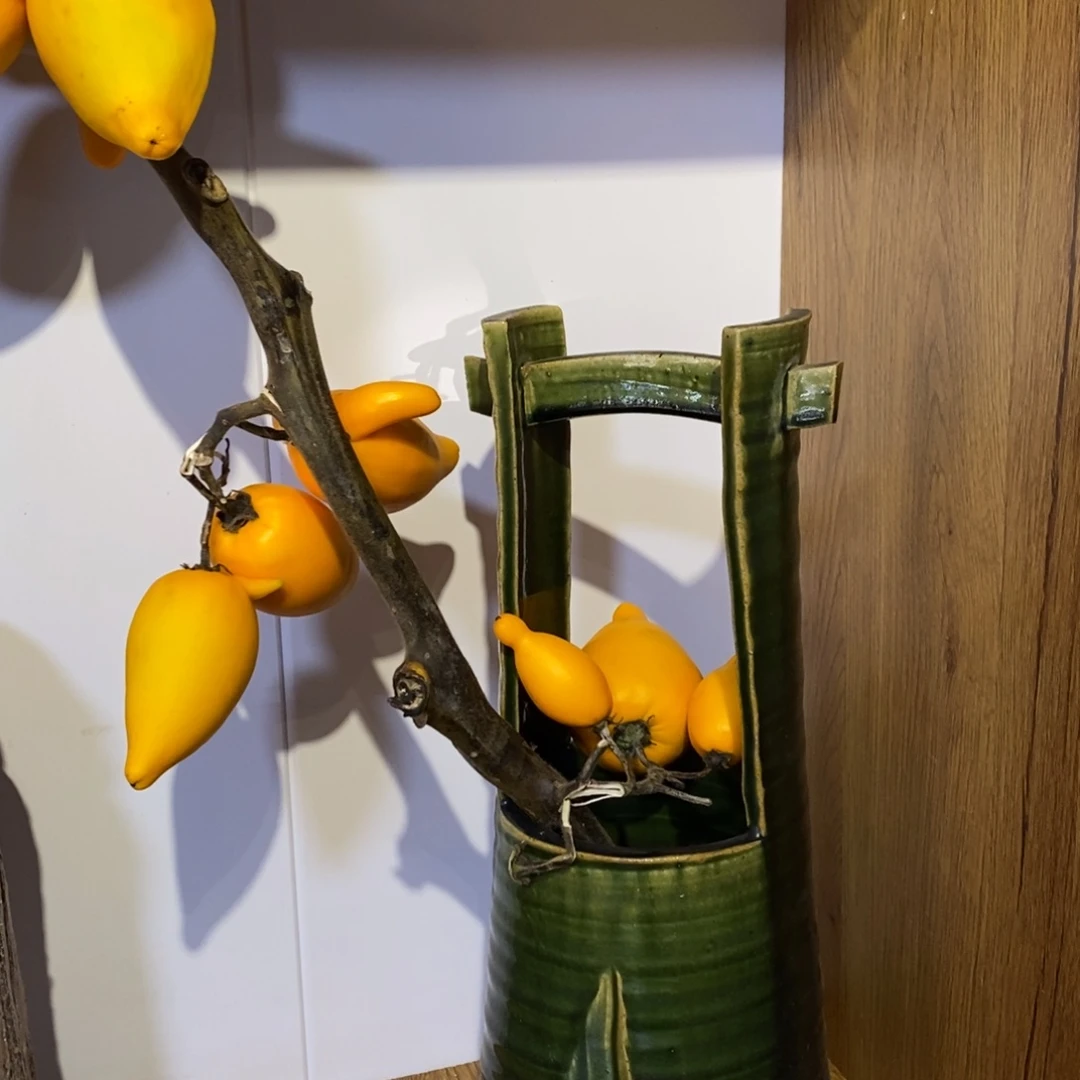 瓷片织部烧提梁花器