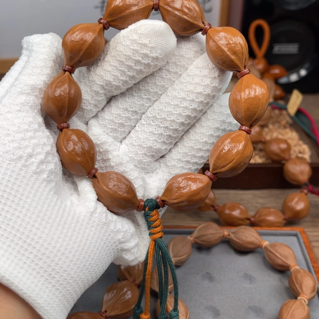 树脂制品19*26梅林铁核手串