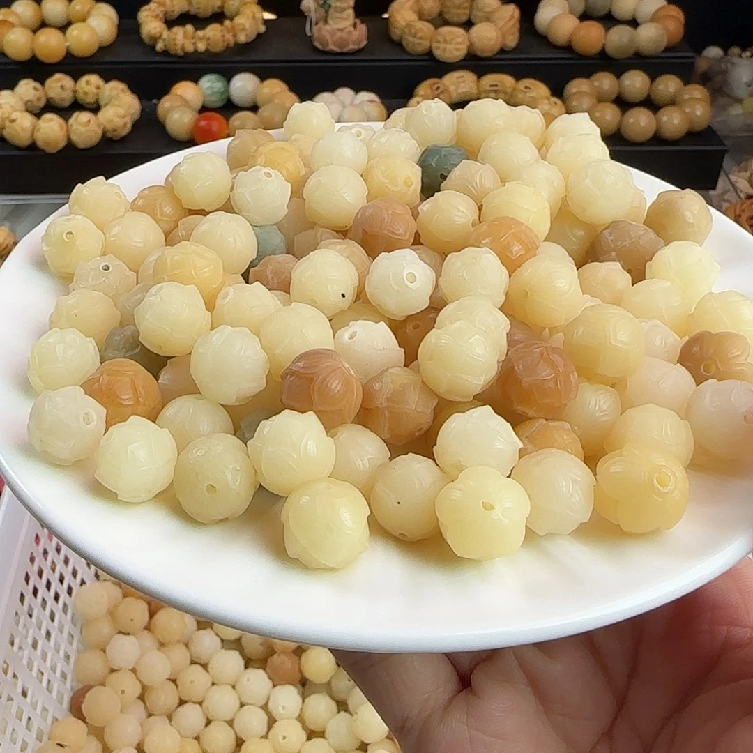 菩提根/象牙果手串瑕疵卡12/13奶黄有钱花1000颗个别有虫眼