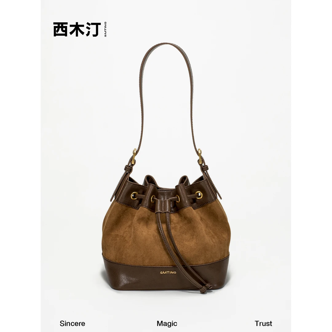 【西木汀】沐光 牛皮水桶包2025春夏新款小众斜挎包磨砂质感包包.