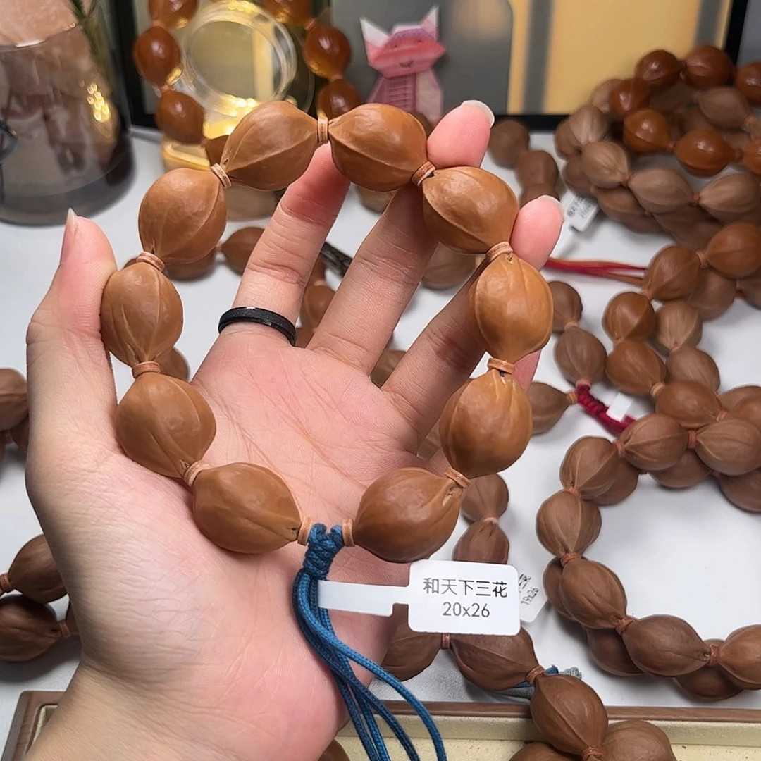 明***。橄榄核吊坠梅林铁核2026