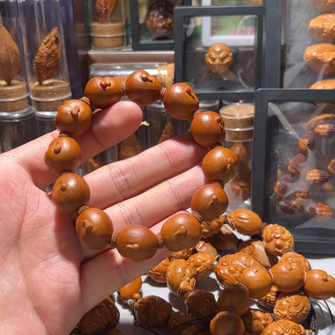 慎***儿手串/手链橄榄核手工百态