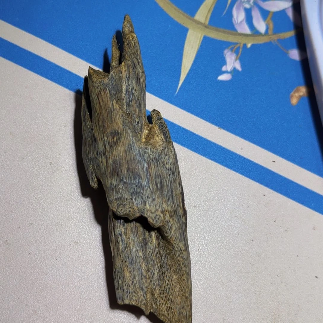 沉香手把件公*哥沉香奇楠野生实心虫漏52克