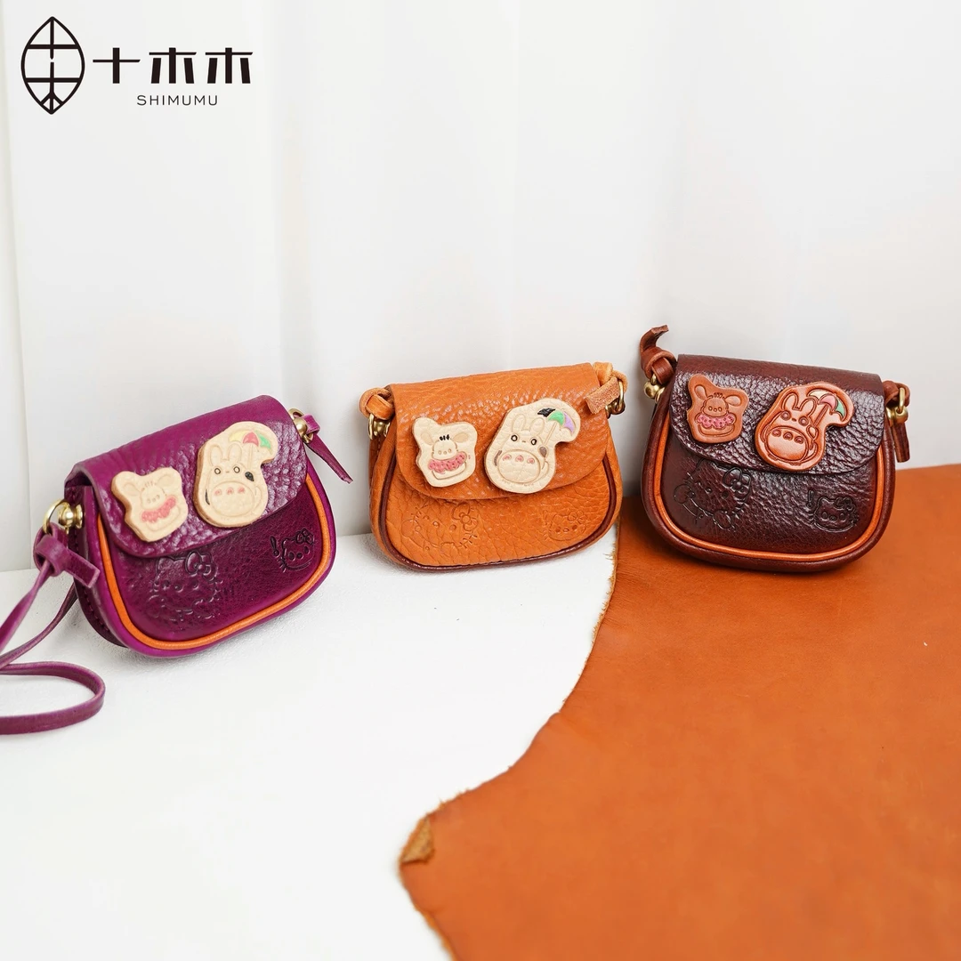 十木木加厚植鞣牛皮凯蒂猫迷你口红包可爱俏皮斜挎包小众高级设计
