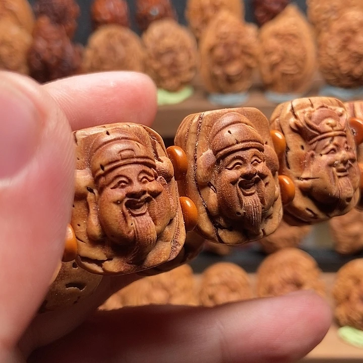桃核浮雕十方财神