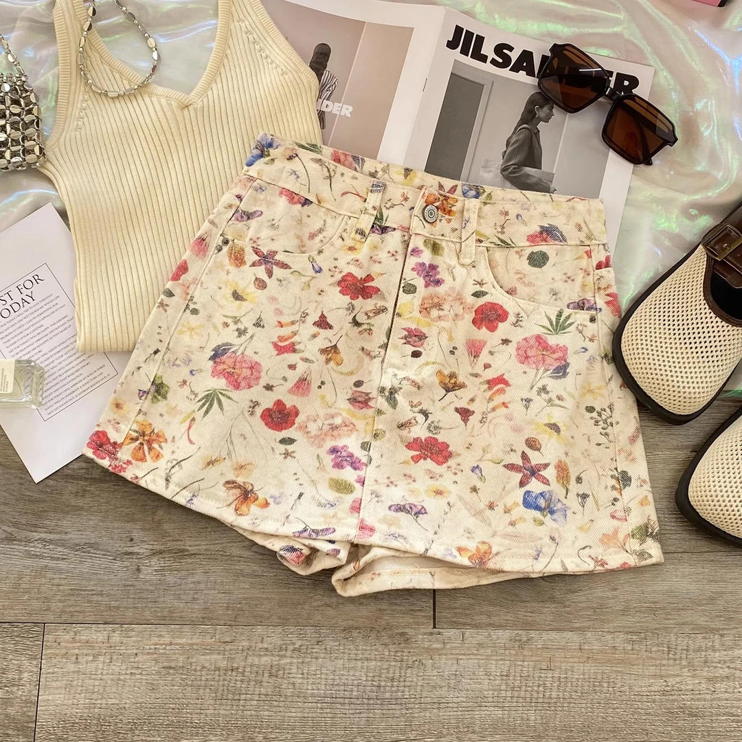 碎花牛仔短裙女秋季薄款2025年高腰显瘦a字包臀印花半身裙裤子女