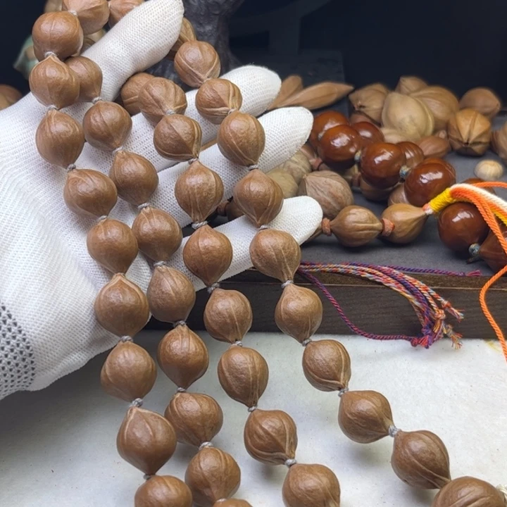 厚***德橄榄核手串/手链1.5*1.8原皮三花铁核脖挂