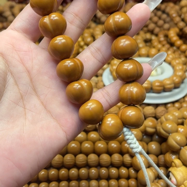 隐***世手串猴头核桃全品屁桃