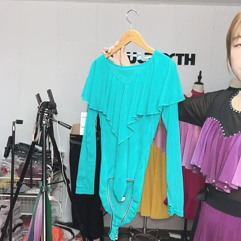 L.
