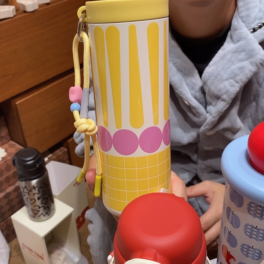 陶条纹黄色吸管杯保温