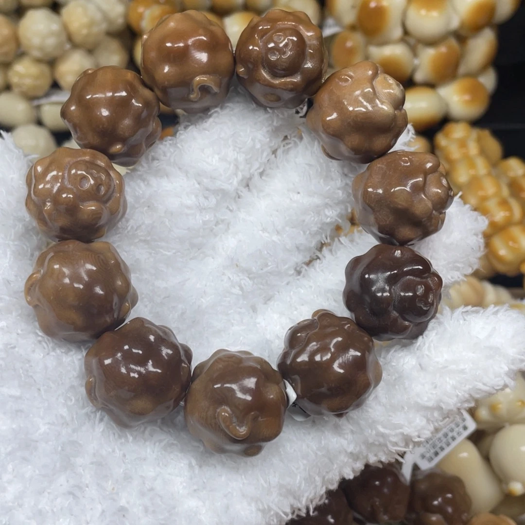菩提根/象牙果手串12.4.11瑕巧克力羊