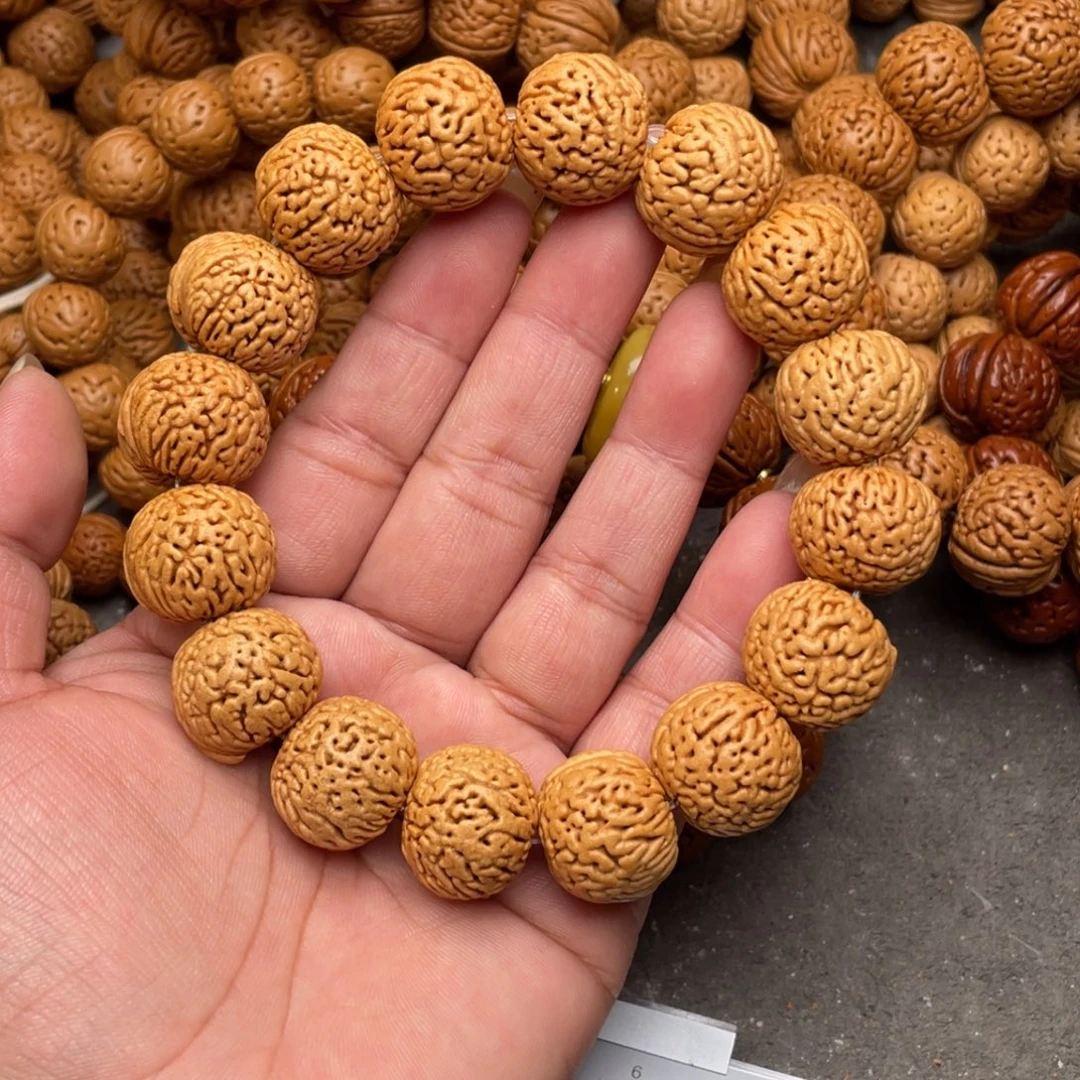 雪***红手串桃核龙鳞苹果闪48