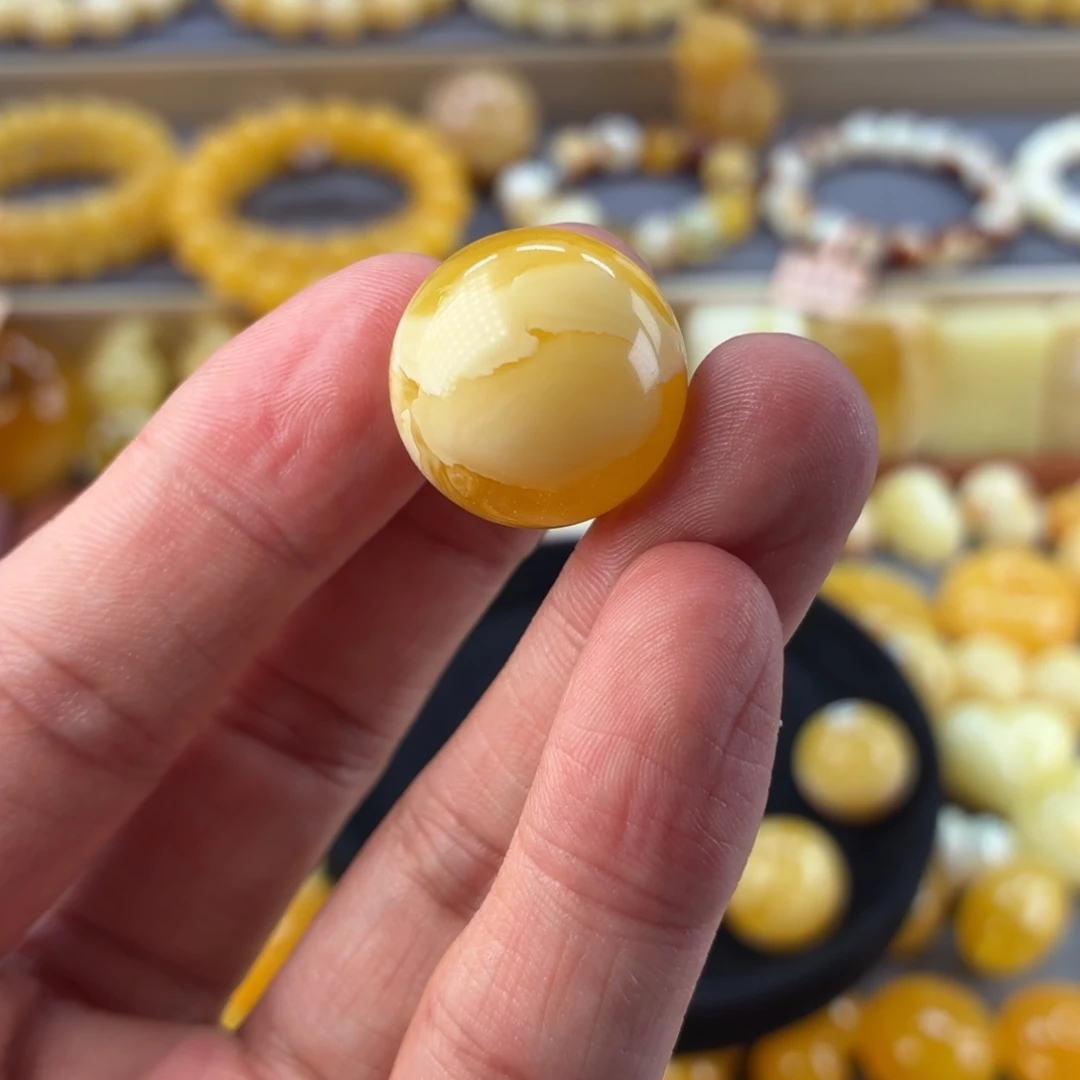 琥珀未镶嵌裸石金白溶洞20mm