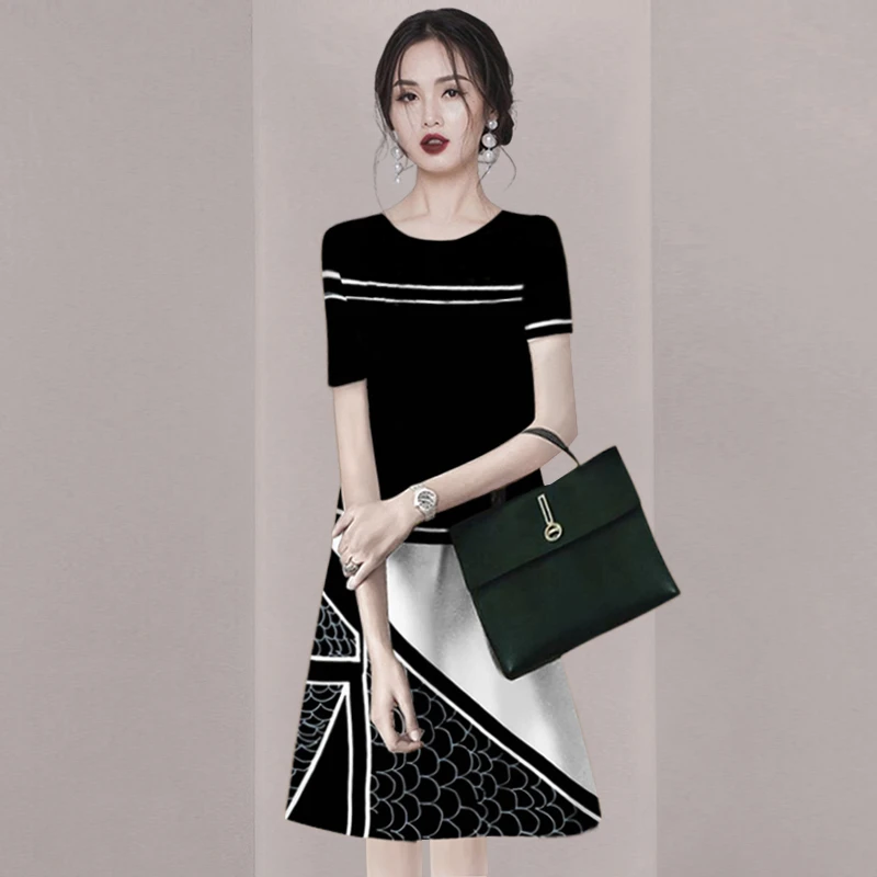 新款设计感拼色气质连衣裙2025夏季轻熟风减龄显瘦A字裙中长款