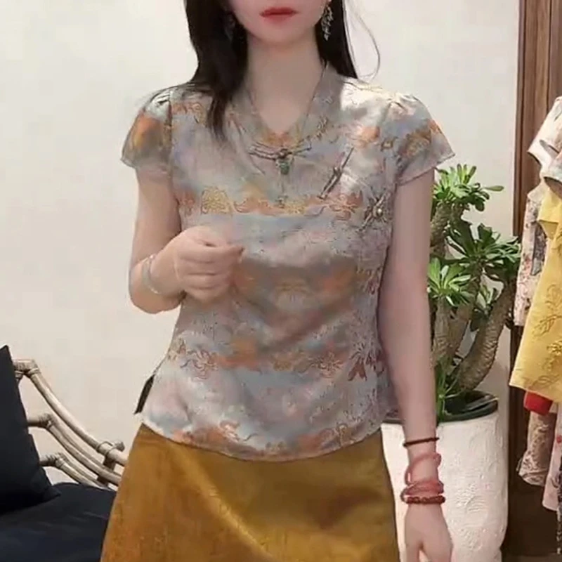 2025年夏季新款蝴蝶无袖上衣显瘦设计款百搭蓝调彩蝶与彩花衣服潮