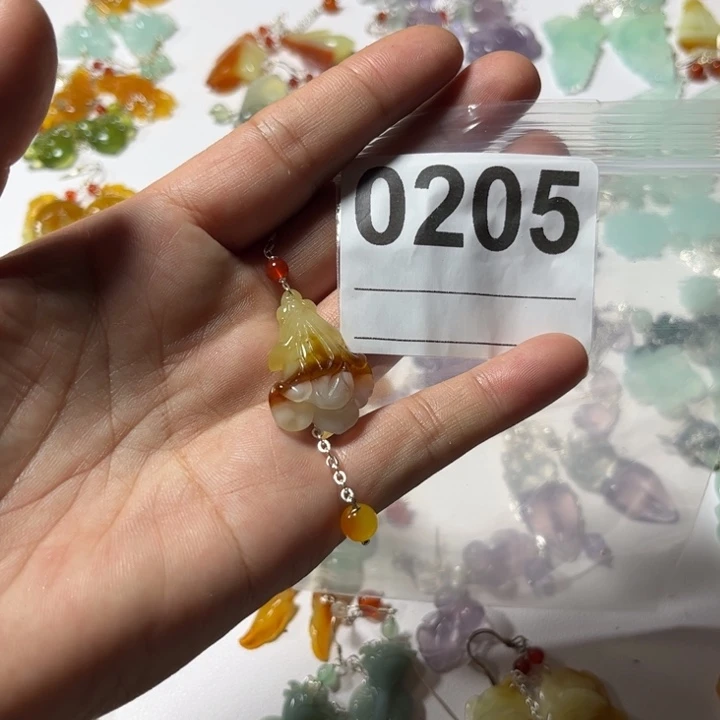 佳***宝合金蛇纹石玉耳饰